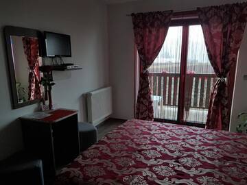 Фото номера Двухместный номер с 1 кроватью Гостевой дом Poarta Paradisului г. Moldoveneşti 11